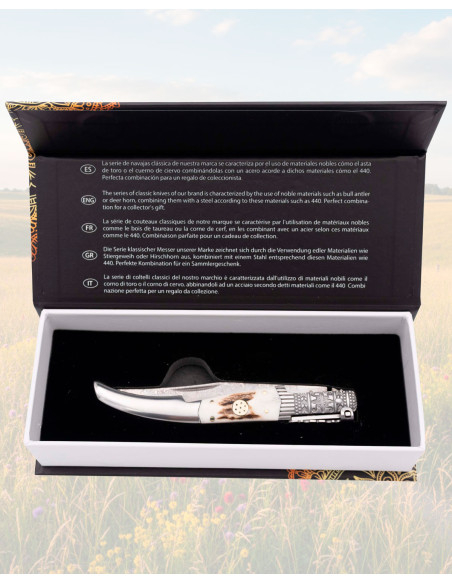 Couteau à rabat Damas et corne de...