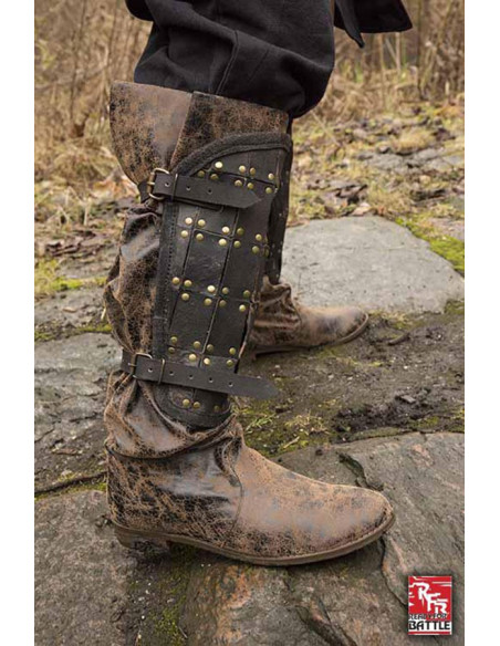 Grèves en cuir de soldat médiéval