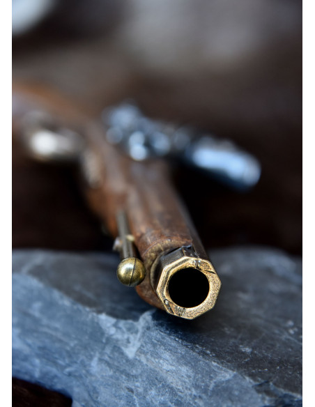 Pistolet à silex plaqué laiton...