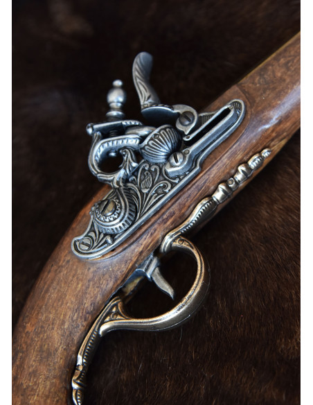 Pistolet à silex plaqué laiton...