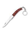Canif à piston avec manche en stamina rouge, lame de 6 cm.