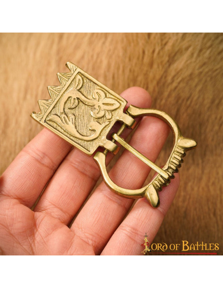 Boucle et finition florale pour...