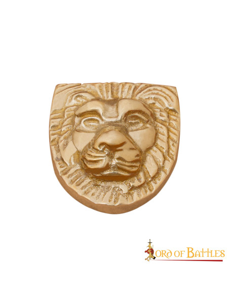 Feuille de laiton à décor de tête de...