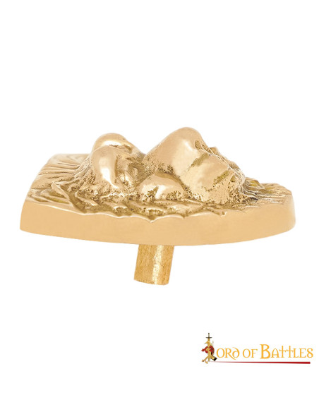 Feuille de laiton à décor de tête de...