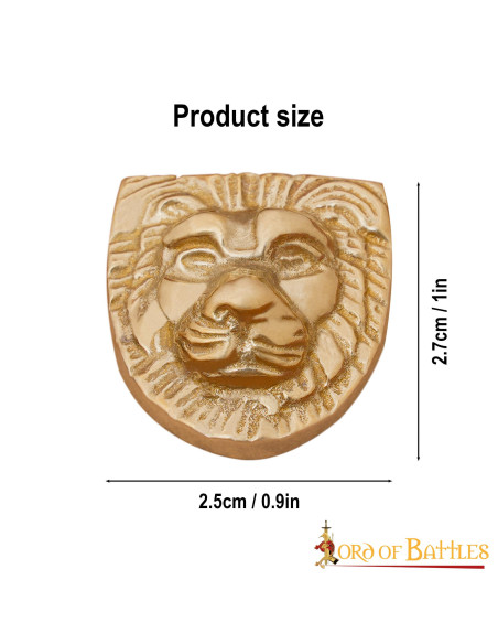 Feuille de laiton à décor de tête de...