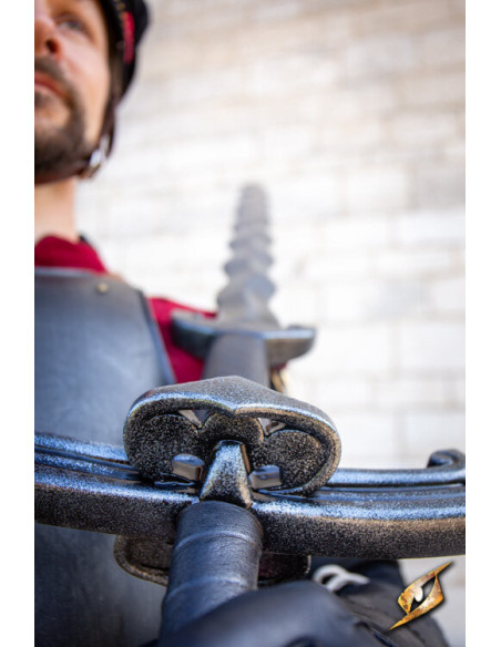 Mandoble de style flammigère...